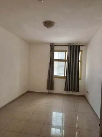 1BR apartment for rent in Al Taawun Sharjah, 2 baths, balcony, central AC, prime location near services and transport, price 43000 AED, 4 payments!