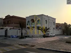Corner villa for sale in Al Muwaihat 1, corner lot on two streets and the main road, area 5000 sq ft