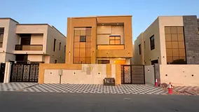 Super deluxe villa for sale in Al Yasmin, Ajman. Includes electricity, water, and air conditioning.