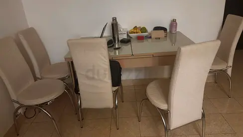 Expandable 6 seater Glass Dining Table with 4 Chairs