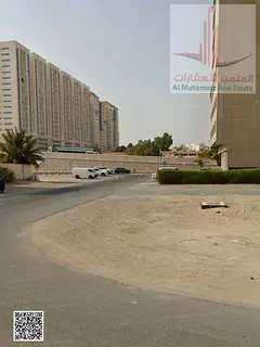 For sale in Ajman, residential/commercial land (G+12) near City Centre Ajman, Jasmine Towers, 10,000