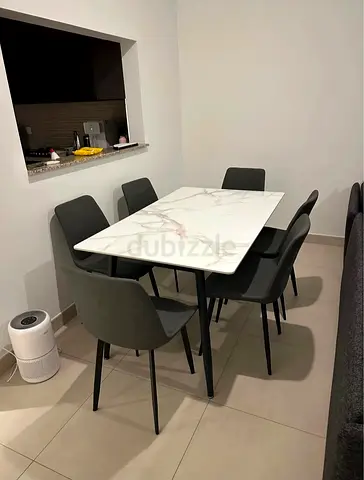 Stylish marble design dining table with 6 chairs. Very strong and stable