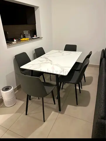 Modern 6-seater dining table set in excellent condition.