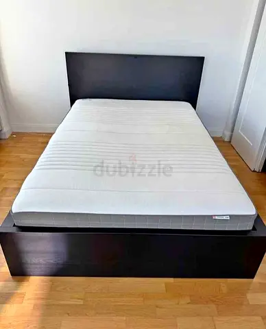 IKEA malam double‑size bed (140 × 200 cm) with 2 storage drawers underneath and an IKEA mattress