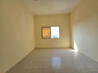 Two bedrooms and a living room in Al Nuaimiya 3, near Al Safir Mall, next to the Pakistani School. 2 bathrooms.