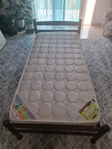 2 x single beds with mattress