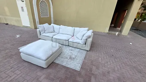 Modular cloud feather filled sofa with footstool