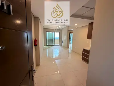 Two bedrooms and a living room with two bathrooms, a gym, a private pool, central air conditioning, and an open view. First occupancy and at the lowes