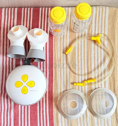 Medela swing maxi Electric Breast Pump with Accessories (AED 1000)