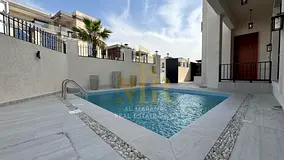 Luxury villa for sale in Al Yasmin, exceptional location near the park | Private pool and waterfall