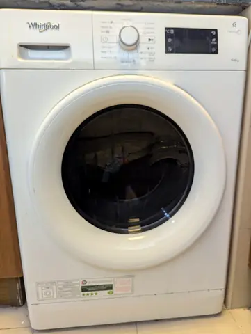 Whirlpool washer dryer combo in excellent working condition.