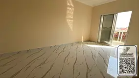 Two-bedroom apartment with a living room in Al Muwaihat 2, spacious area, 3 bathrooms, central air c