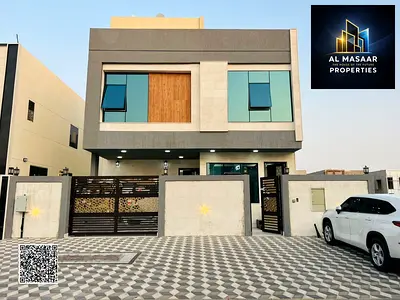 Turnkey villa, priced inclusive of registration fees, electricity, and water, located on the main street, ready for immediate occupancy in one of Ajma