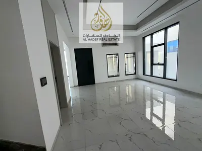 Annual rent in Ajman, Al Yasmeen area, Sheikh Mohammed Bin Zayed Street, Dubai and Sharjah exit. Two-story villa with 6 bedrooms, living room, kitchen