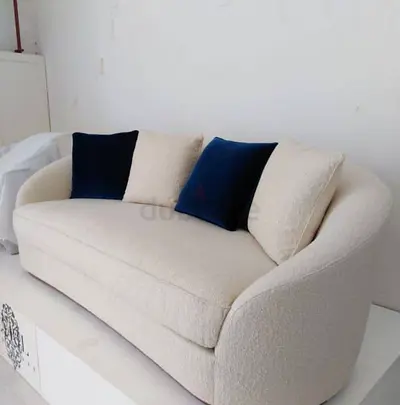 Elegant  3 seater Curved Sofa beige colour