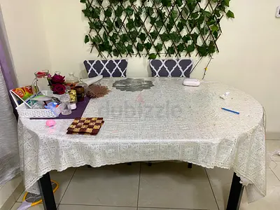 2 In 1 - Oval shape Dining Table  with 4 Chairs. Foldable to round shape