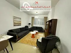 One bedroom and living room, Al Taawun Tower, Manazel 3