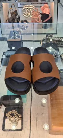 Hermes calfskin brown Edith sandals