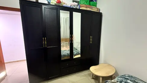 Sturdy Black Wardrobe with Mirror and Storage Drawers