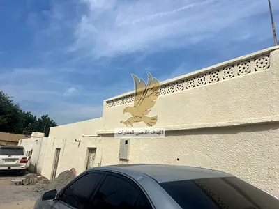 For rent: A traditional Arabic house in Al Qadisiyah area, 2500 sq ft, consisting of five rooms, three bathrooms, and two kitchens. Originally two sep