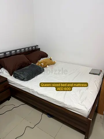 Queen sized bed and mattress