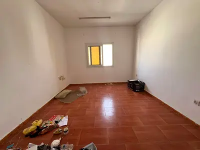 Annual rental opportunity in the heart of Sharjah, Al Naba'a area: Two bedrooms and a living room, spacious, central air conditioning, central gas, at