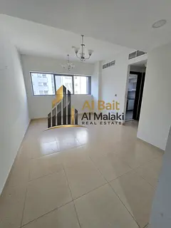 One bedroom and living room in Al Taawun Located in Taani Place directly on the Dubai exit Payable i