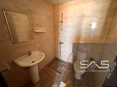 Studio apartment with a semi-detached kitchen, central air conditioning, spacious areas, and a prime
