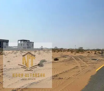 A prime investment opportunity: Own a commercial plot of land opposite the park in the Al-Arqoub area, available for freehold ownership to all nationa