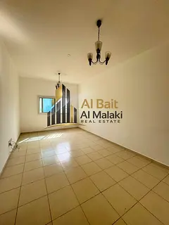 A one-bedroom apartment with a living room in Al Majaz 3, located in a prime area close to all vital