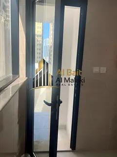 One bedroom, living room, and balcony in Al Taawun, directly on the Dubai exit. Brand new building,