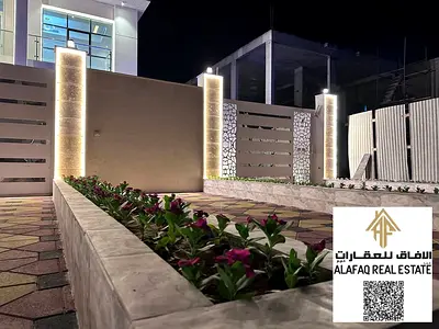 Luxury villa for sale in Al Yasmeen with 8 bedrooms, majlis and living hall, spacious areas, multiple parking spaces, smart duct AC, priced at AED 1.8
