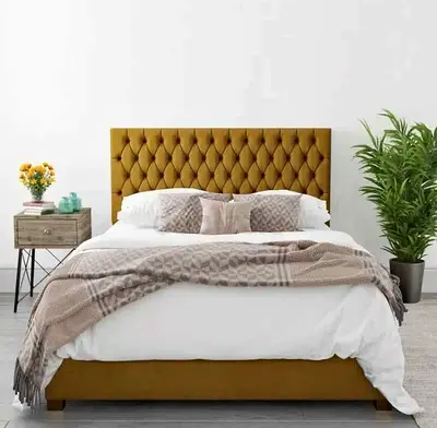 Stylish Yellow Upholstered Bed with Decorative Headboard
