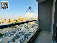One-bedroom apartment for sale in Al Nuaimiya One Tower with a modern design and spacious layout. Fe