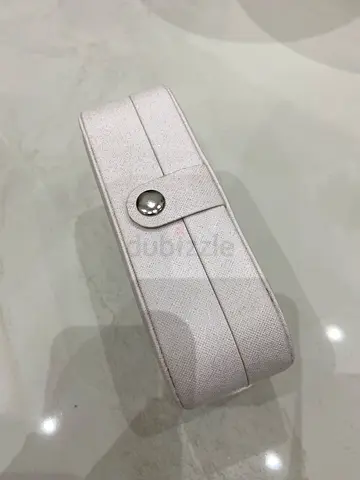 A white travel jewelry box designed for storing accessories on the go or at home. Rozetka Rozetka +1