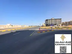 –Residential land for sale in Al Alia area, close to the Tiger project.