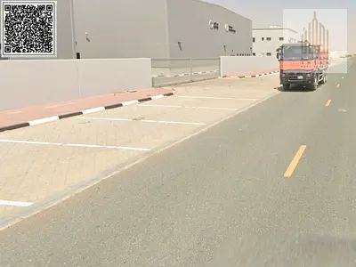 للبيع ارض سكني تجاري بمنطقة العالية علي شارع اسفلت