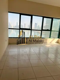 **3-bedroom apartment with a living room for rent in Al Qasba – stunning canal view with free park