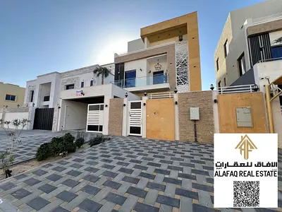 فيلا فاخرة للبيع في عجمان الحليو 2 مقابل فام تاور بتصميم عصري أرضي أول روف خمس غرف نوم مسبح خاص تشطيب مميز جاهزة للسكن بسعر شامل الخدمات