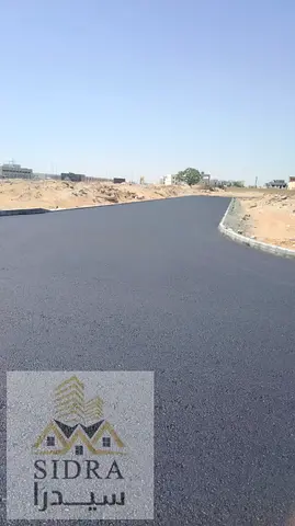 For sale: Two adjacent residential-commercial land plots.