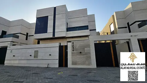 Luxury Villa for Sale in Al Helio 1 Ajman with Modern Design, Super Deluxe Finishing, Spacious Layout with Four Bedrooms, Five Bathrooms, Private Pool