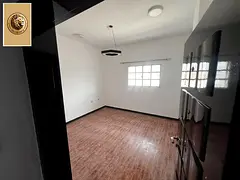 One-bedroom apartment with a living room for annual rent in Al-Rashidiya 1, a prime location opposit