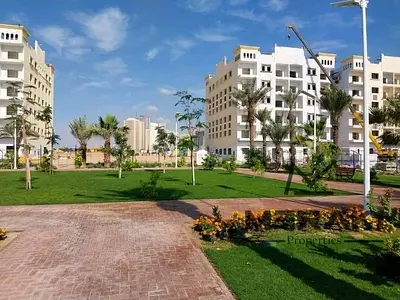 The lowest price for a one-bedroom apartment with a living room in Amira Village, in an amazing location on Mohammed bin Zayed Road, ready to move