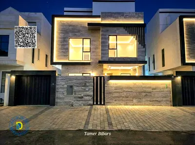 For sale, a luxurious 5-room villa with pool and roof, including registration fees and AC, in AL Yasmine , freehold , bank financing