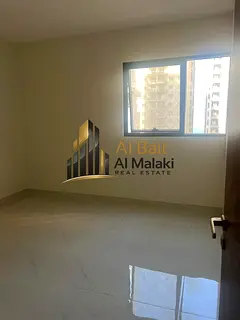 One bedroom, living room, and balcony in Al Taawun, directly on the Dubai exit. Brand new building,