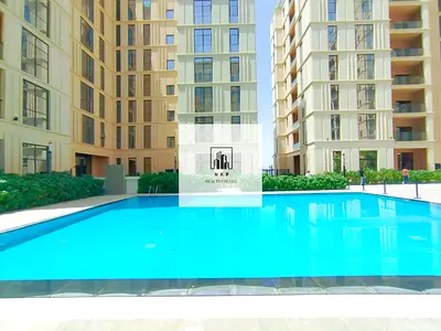 Spacious luxurious 1bhk apartment with kitchen appliances and pool view