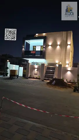For sale in Al Amerah, a villa with a swimming pool and a stone facade. Super deluxe finishing** 5 bedrooms, a majlis,a living roomm