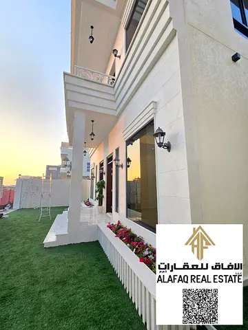 فيلا جديدة وفاخرة للبيع في منطقة العامرة بعجمان بتصميم عصري وتشطيب راقٍ تشمل أربع غرف نوم ماستر، مجلس واسع، صالتين، خمس حمامات، وارتداد أمامي 3 متر يو