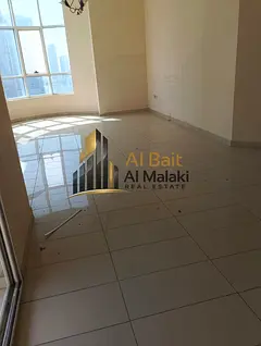 Two bedrooms, a living room, and a balcony in Al Qasba Stunning view in free Free gym access Contrac