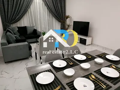 شقة غرفتين وصالة بإطلالة بحرية للبيع في أبراج الواحة – برج T1، طابق مرتفع، مساحات واسعة مع بلكونتين، باركن ومسبح وجيم، أقساط قائمة وفرصة استثمار مميزة
